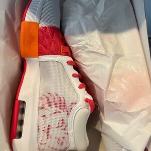 Men’s White Athletic Shoes with Pink & Orange Accents